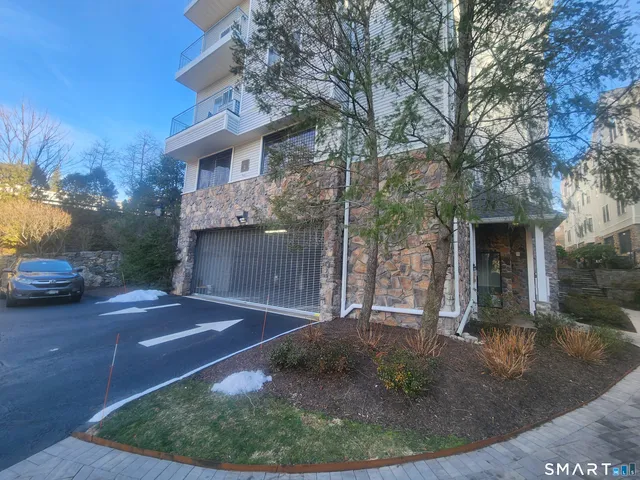 a view of swimming pool with a yard and trees