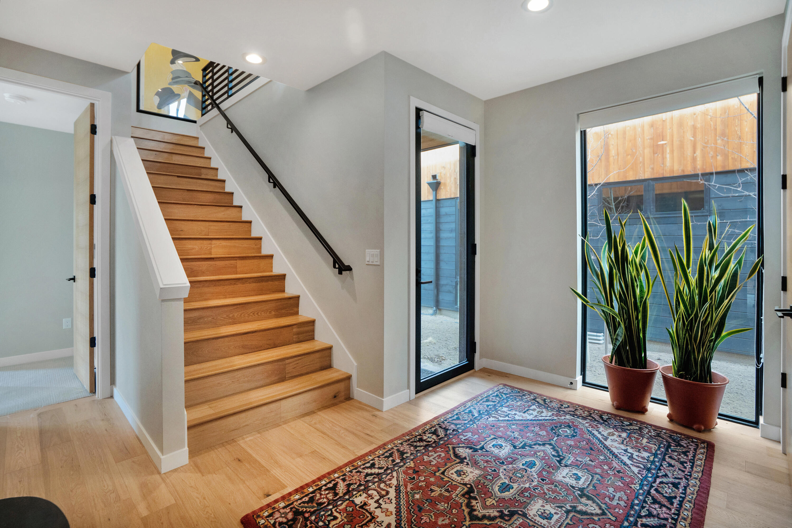 61250 Meeks Trail Bend, OR 97702 - Photo 6 of 43 a view of entryway and hall with wooden floor
