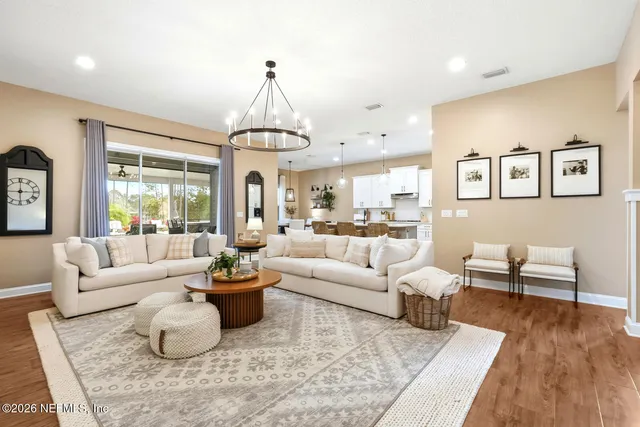 a utility room with multiple dryer and washer