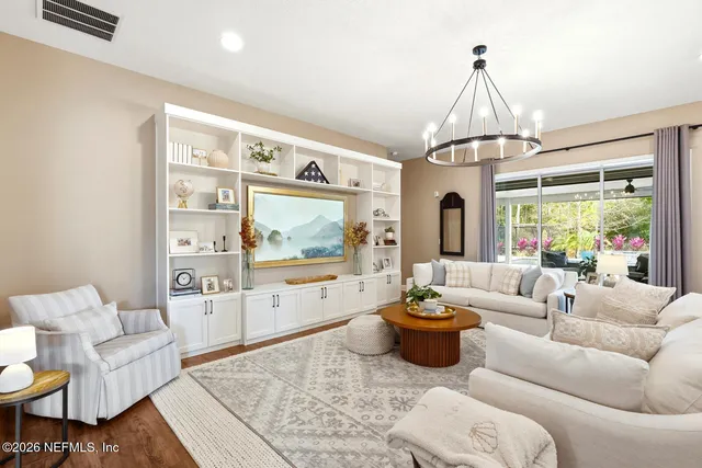 a kitchen with stainless steel appliances a refrigerator and a stove