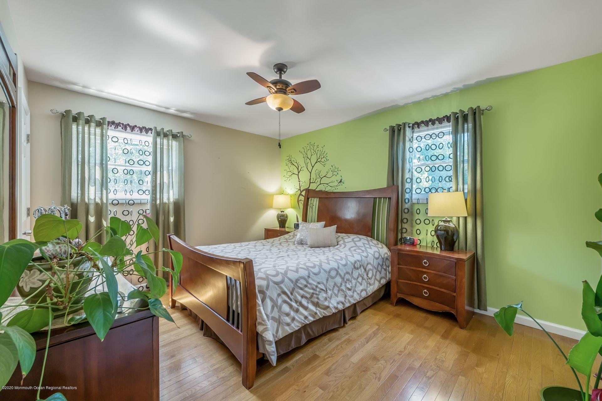 17 Appleman Road Somerset, NJ 08873 - Photo 11 of 20 a bedroom with a bed potted plant with the window