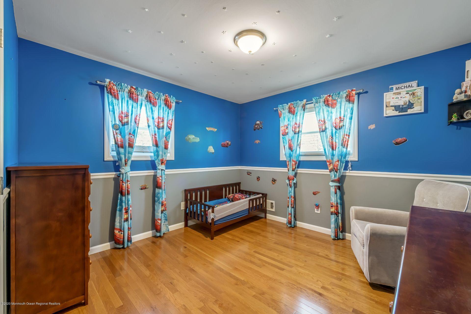 17 Appleman Road Somerset, NJ 08873 - Photo 12 of 20 a bedroom with furniture and a flat screen tv