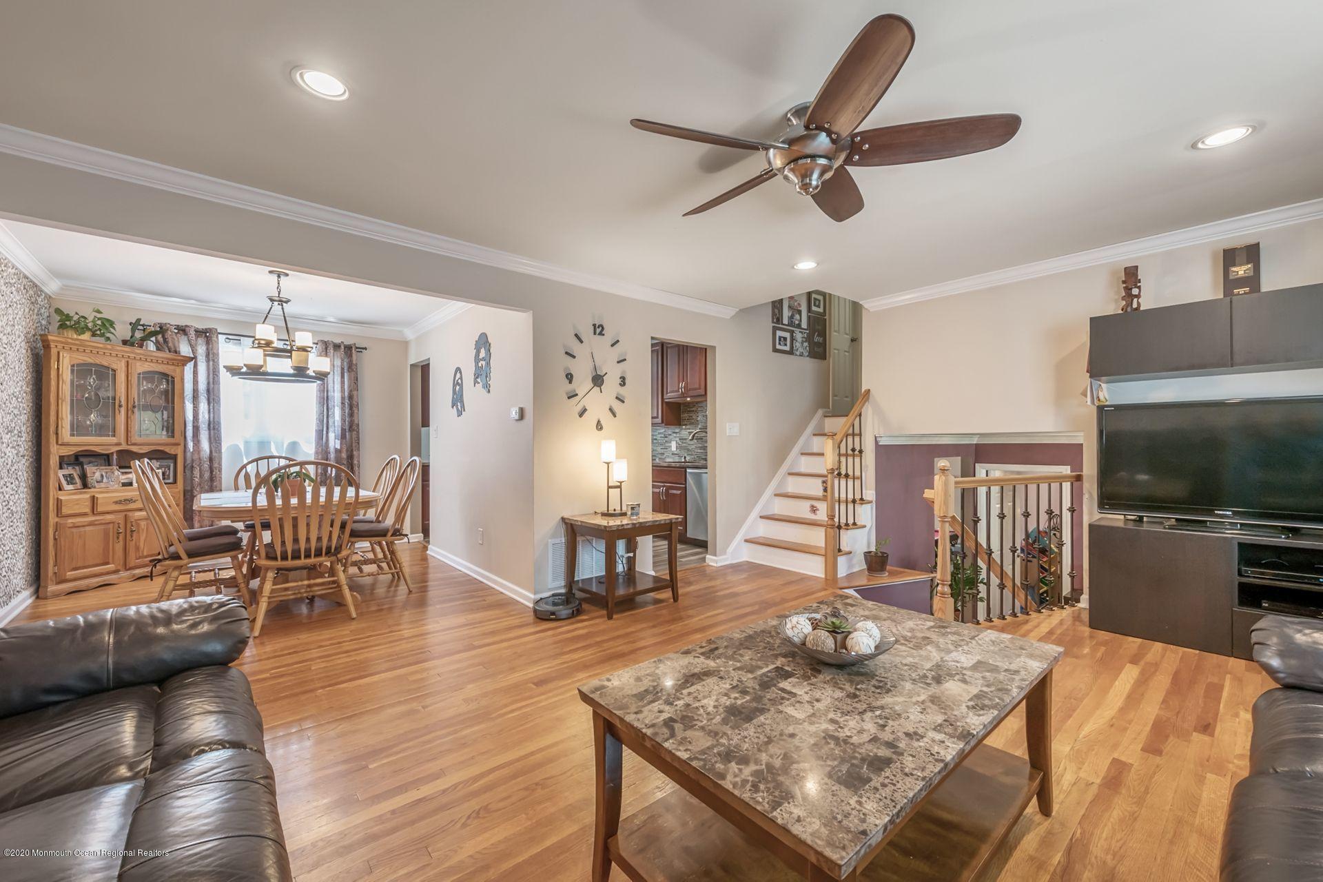 17 Appleman Road Somerset, NJ 08873 - Photo 4 of 20 a living room with furniture and a wooden floor