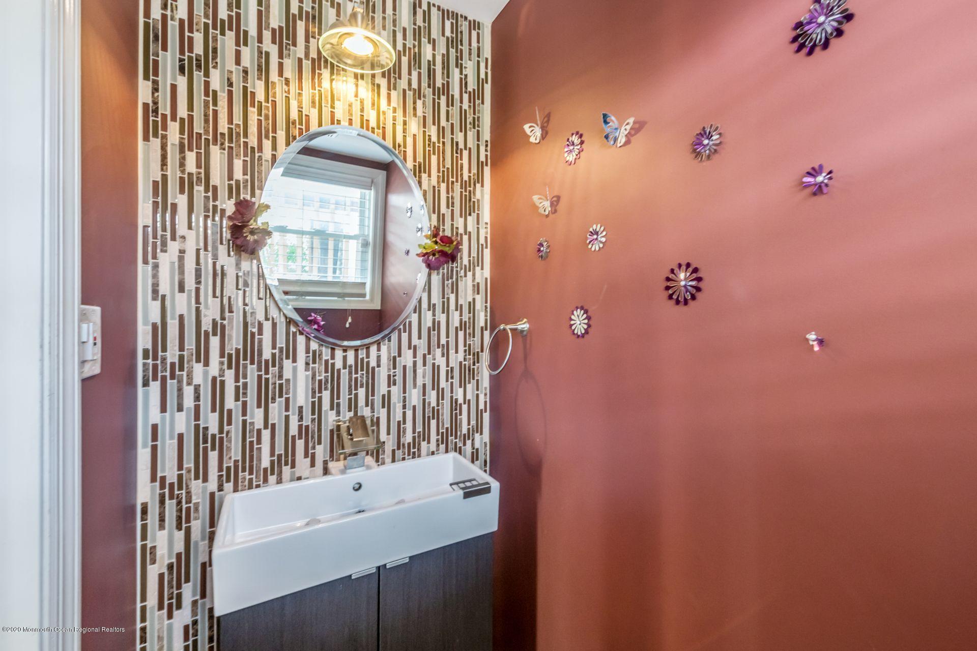 17 Appleman Road Somerset, NJ 08873 - Photo 8 of 20 a bathroom with a sink and a mirror