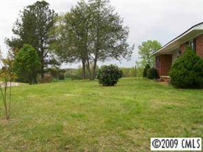 560 State Rd S-13-914 Pageland, SC 29728 - Photo 3 of 6 a view of backyard with green space