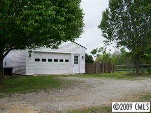 560 State Rd S-13-914 Pageland, SC 29728 - Photo 4 of 6 a view of a house with a yard
