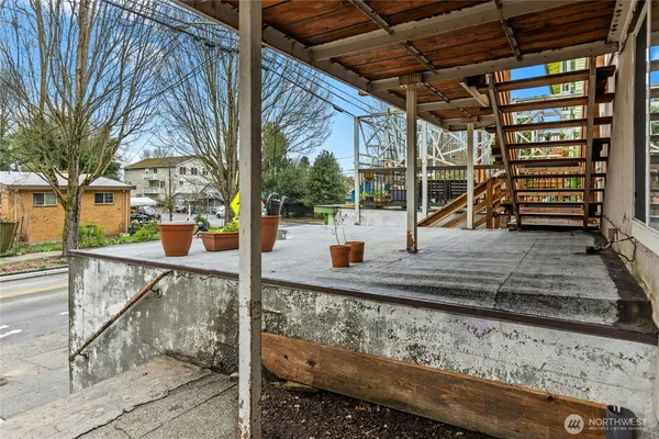 a view of a porch with sitting area