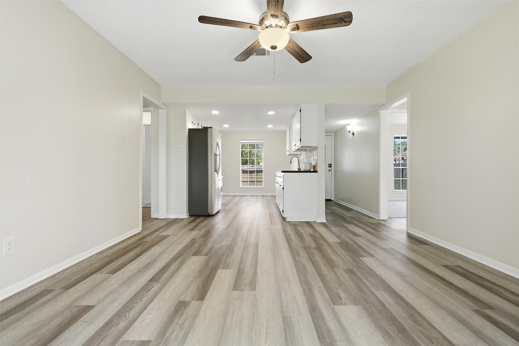 1503 Tarberry Road Houston, TX 77088 - Photo 12 of 33 View of the living room looking towards the front of the home.