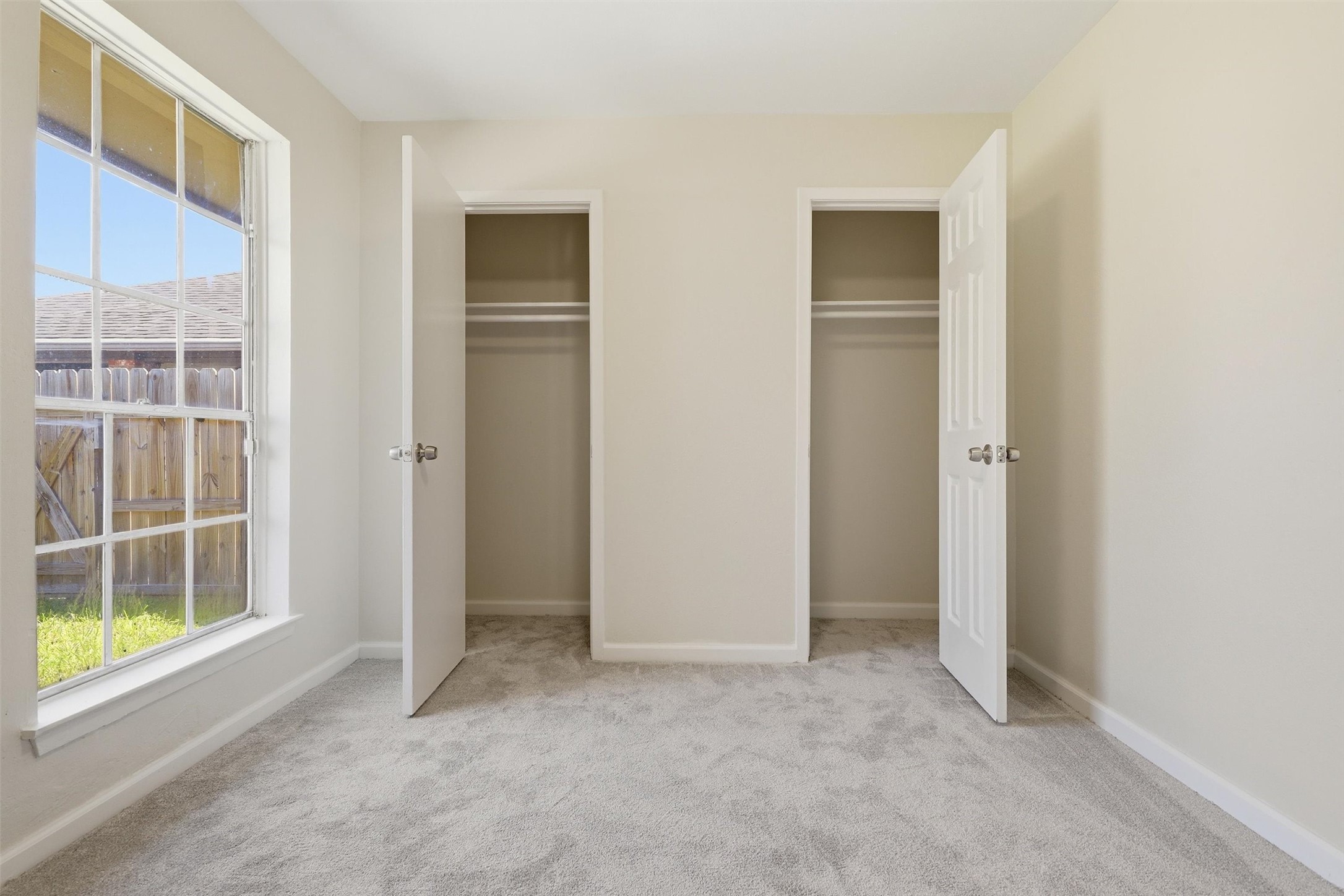 1503 Tarberry Road Houston, TX 77088 - Photo 18 of 33 Alternate view of the front guest bedroom showing both closet spaces.