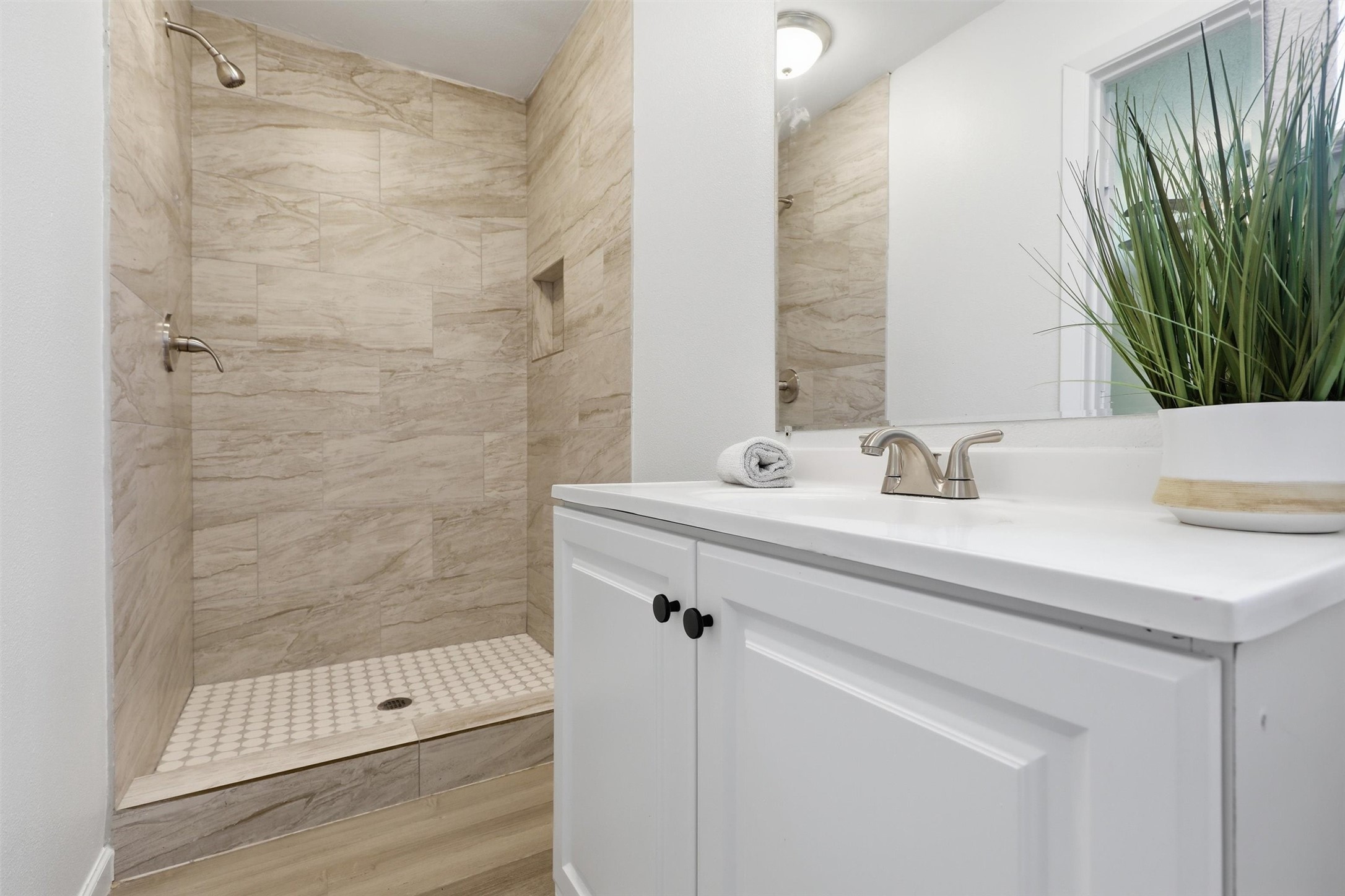 1503 Tarberry Road Houston, TX 77088 - Photo 23 of 33 Primary en-suite bathroom with a walk-in shower, tiled floor to ceiling.