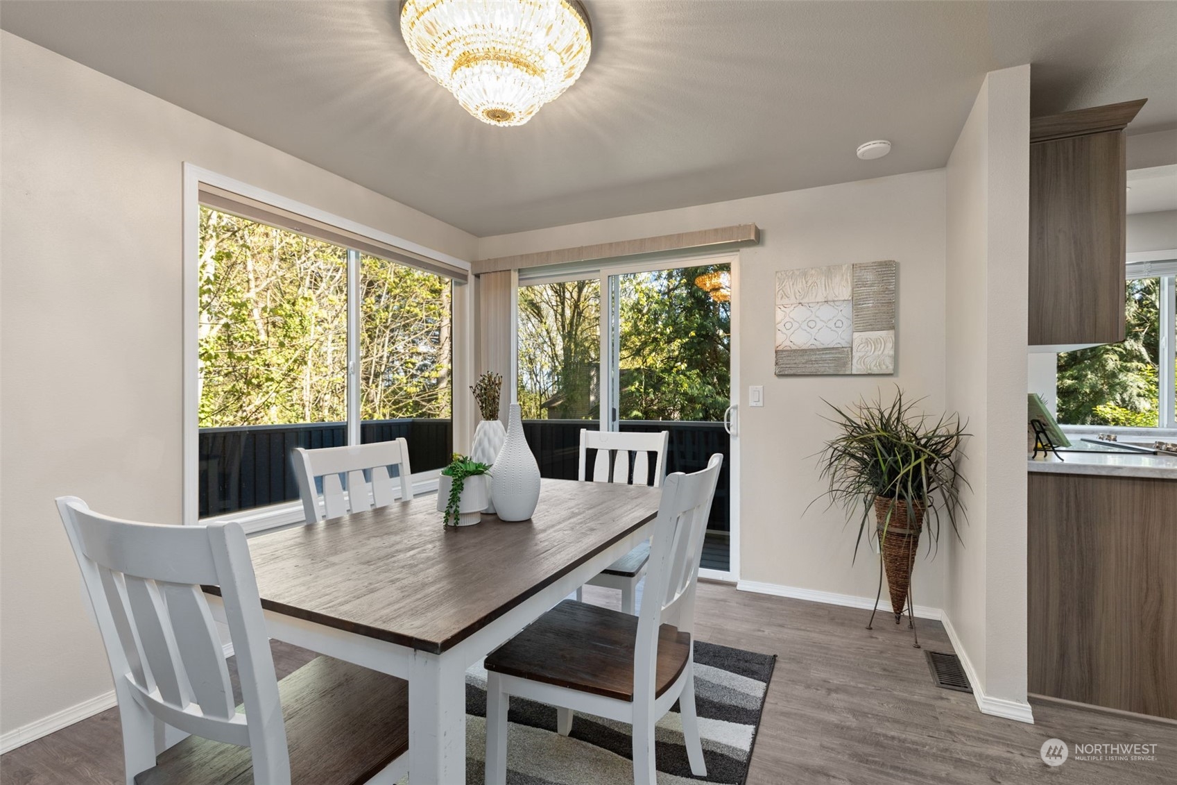 21701 4th Avenue Southeast Bothell, WA 98021 - Photo 8 of 40 a view of a dining room with furniture window and wooden floor