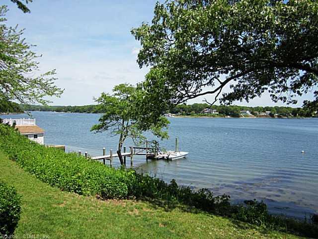 16 Bishops Bay Road East Lyme, CT 06357 - Photo 1 of 1 a view of a lake with a lake