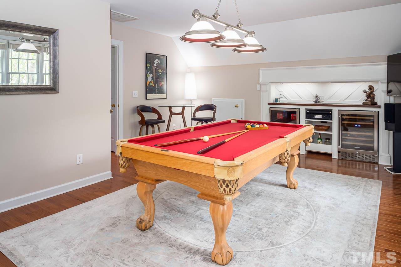 605 Manor Ridge Road Carrboro, NC 27510 - Photo 22 of 30 a dining room with furniture and chandelier
