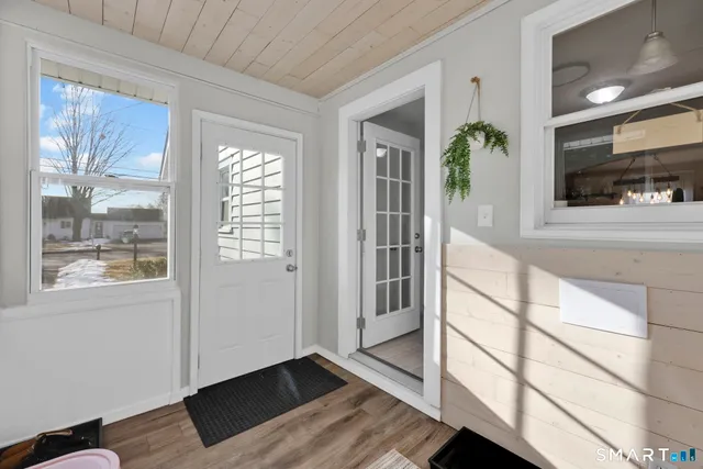 a view of a room that has a large window