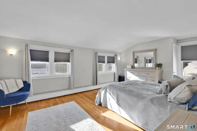 a bed room with a bed and a couch