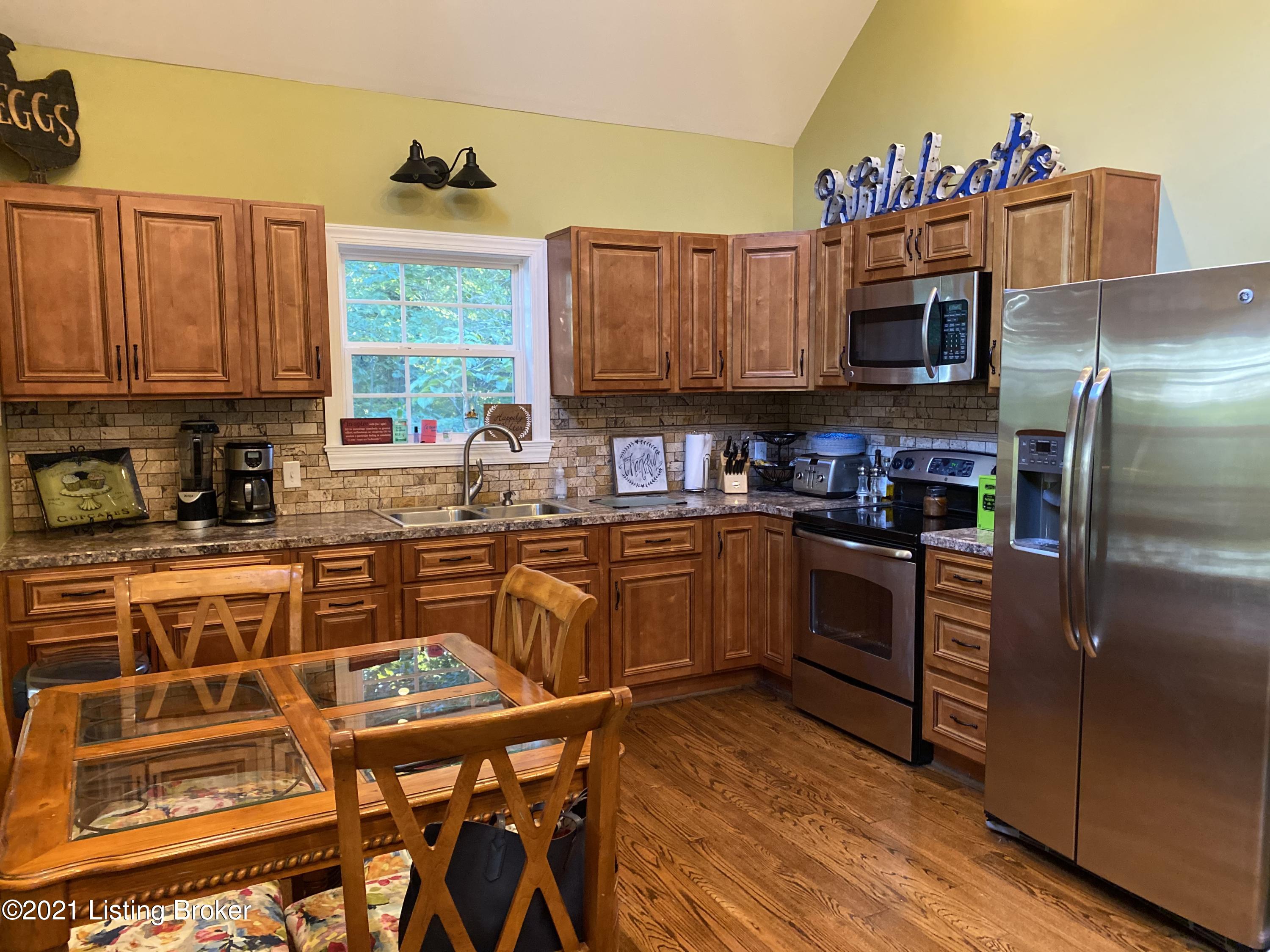121 Nolin Pk Loop Clarkson, KY 42726 - Photo 4 of 18 eat in kitchen with beautiful hardwood