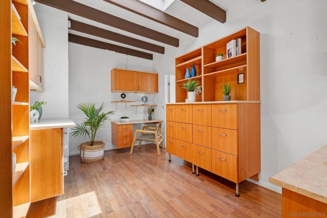 a sign board with yard in front of it