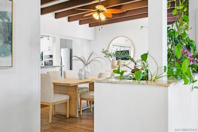 a living room with furniture fireplace and a flat screen tv