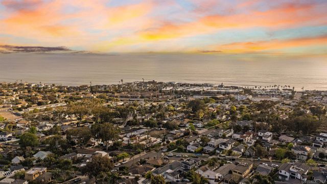 a view of a chairs and table in the patio