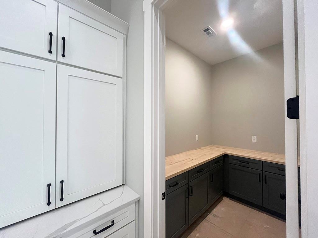 189 Pope Drive Canton, GA 30114 - Photo 19 of 20 a bathroom with a double vanity sink and mirror