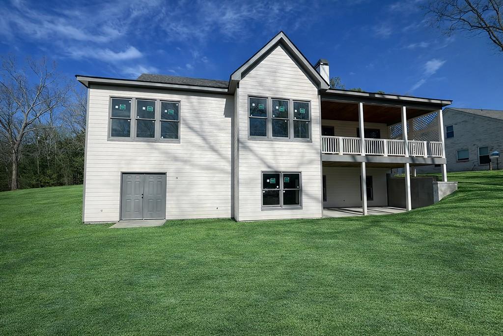 189 Pope Drive Canton, GA 30114 - Photo 2 of 20 a front view of a house with a yard