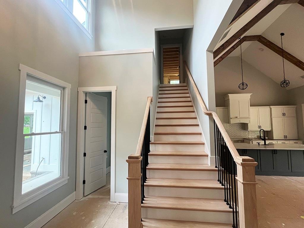 189 Pope Drive Canton, GA 30114 - Photo 6 of 20 a view of entryway and hall with wooden floor