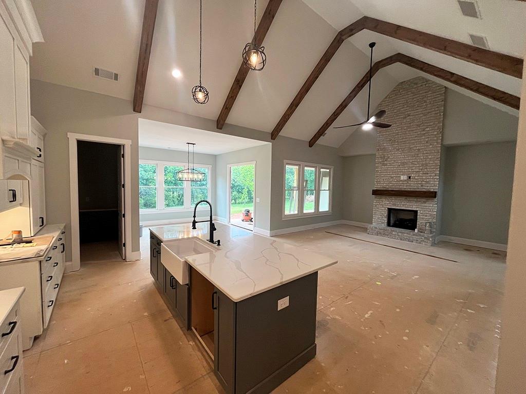 189 Pope Drive Canton, GA 30114 - Photo 9 of 20 a living room with furniture and a fireplace