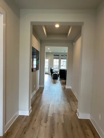 a view of a house with wooden floor