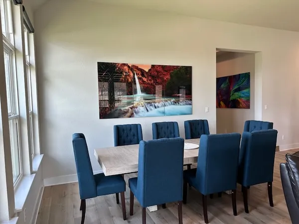 a view of a dining room with furniture