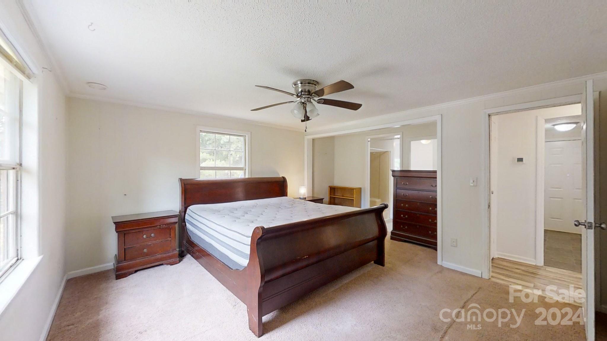 637 Hill Road Lincolnton, NC 28092 - Photo 18 of 26 a bedroom with a bed and window