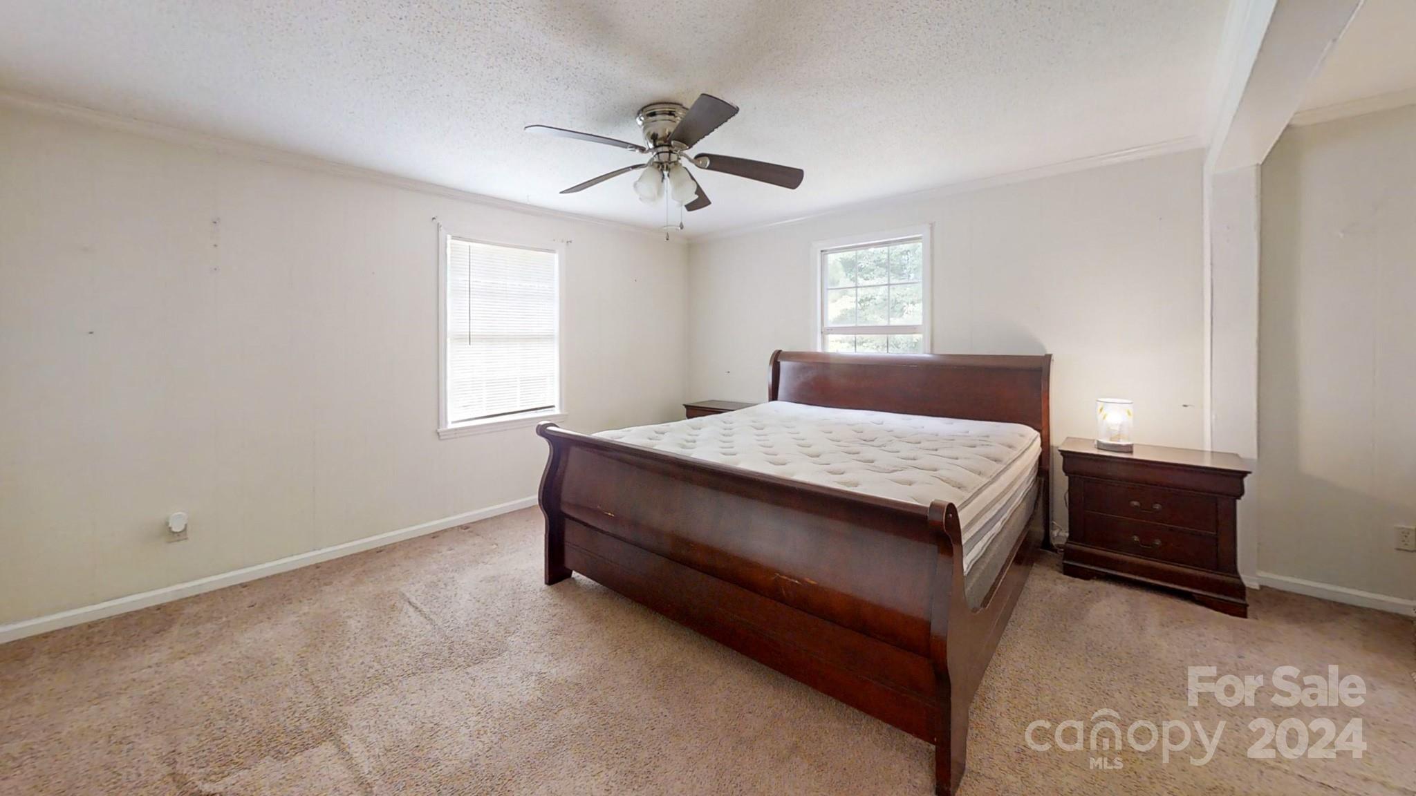 637 Hill Road Lincolnton, NC 28092 - Photo 21 of 26 a bedroom with a bed and window