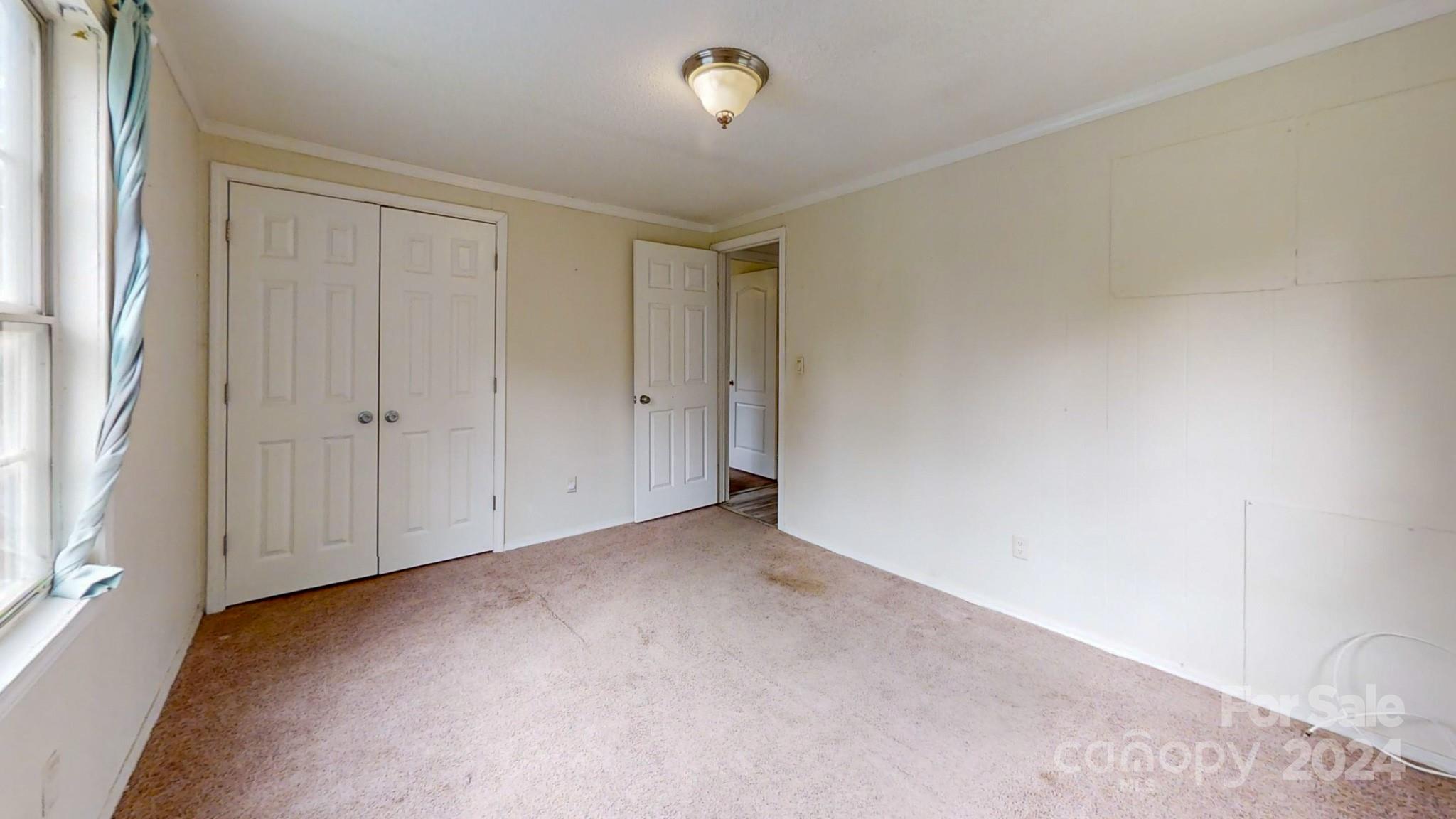637 Hill Road Lincolnton, NC 28092 - Photo 22 of 26 a view of an empty room with a window