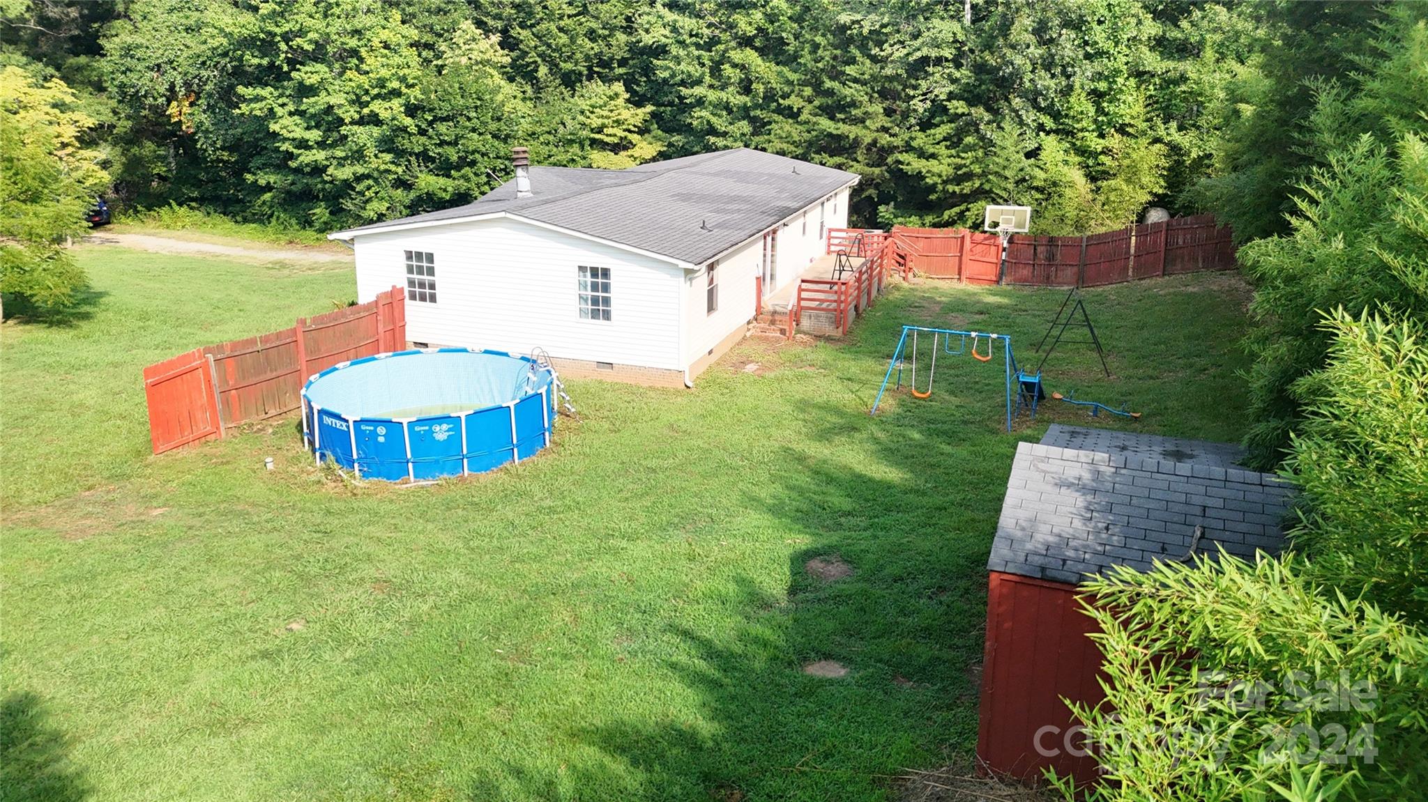 637 Hill Road Lincolnton, NC 28092 - Photo 5 of 26 a aerial view of a house with table and chairs and a yard