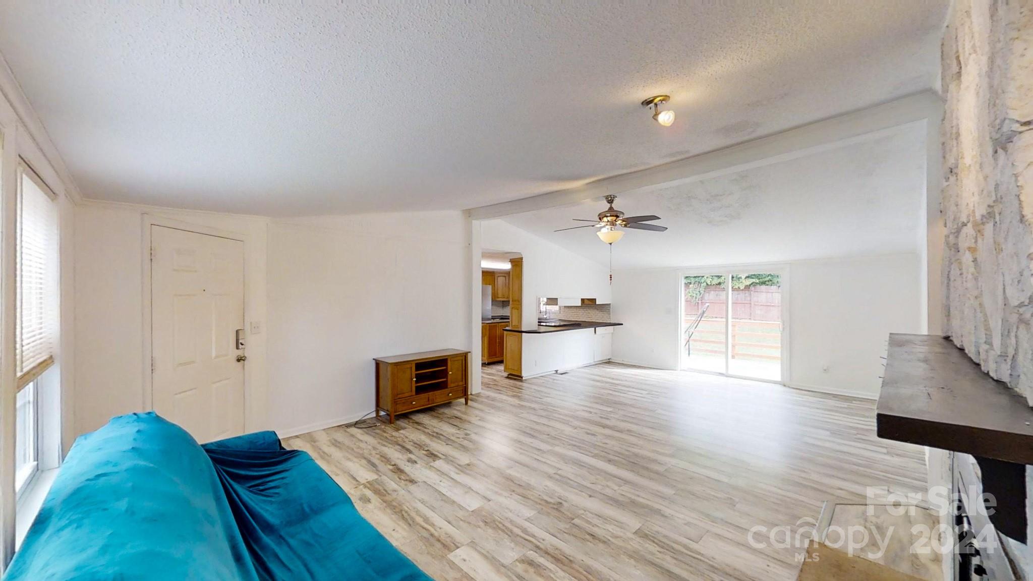 637 Hill Road Lincolnton, NC 28092 - Photo 8 of 26 a view of a kitchen with wooden floor and a sink