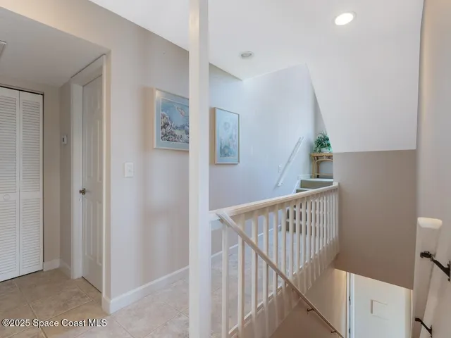 a view of a hallway with windows