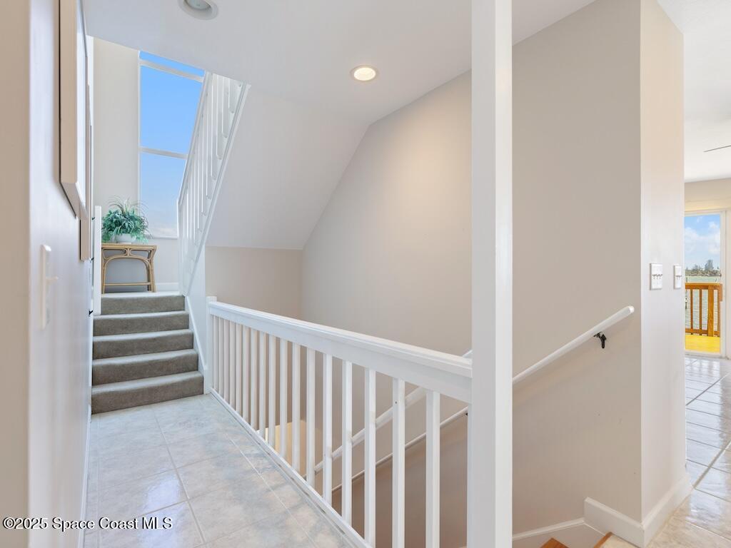 8820 44th Avenue Sebastian, FL 32958 - Photo 24 of 48 a view of a hallway with wooden floor and a bathroom