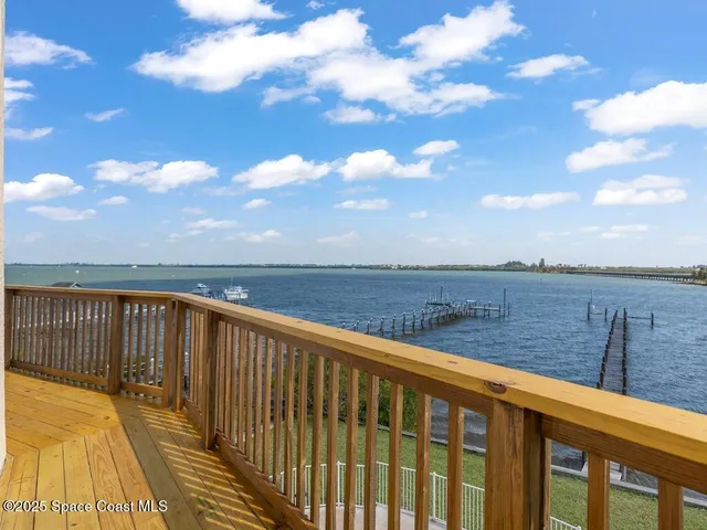 a view of outdoor space with wooden deck