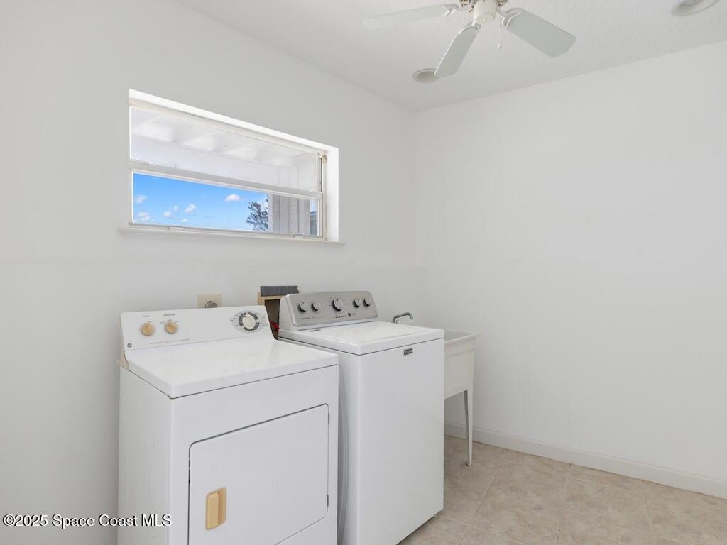 8820 44th Avenue Sebastian, FL 32958 - Photo 39 of 48 a utility room with dryer and washer