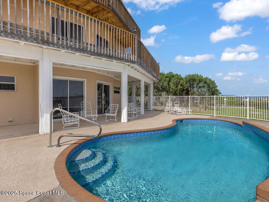 8820 44th Avenue Sebastian, FL 32958 - Photo 5 of 48 swimming pool view with a garden space