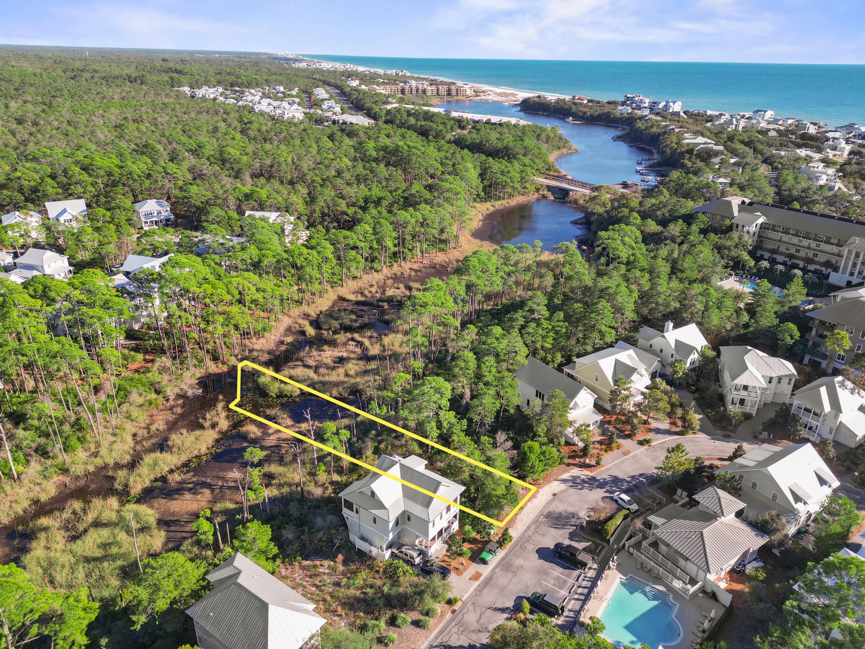 258 Cabana Trail Santa Rosa Beach, FL 32459 - Photo 2 of 14 an aerial view of a city with lots of residential buildings ocean and mountain view in back