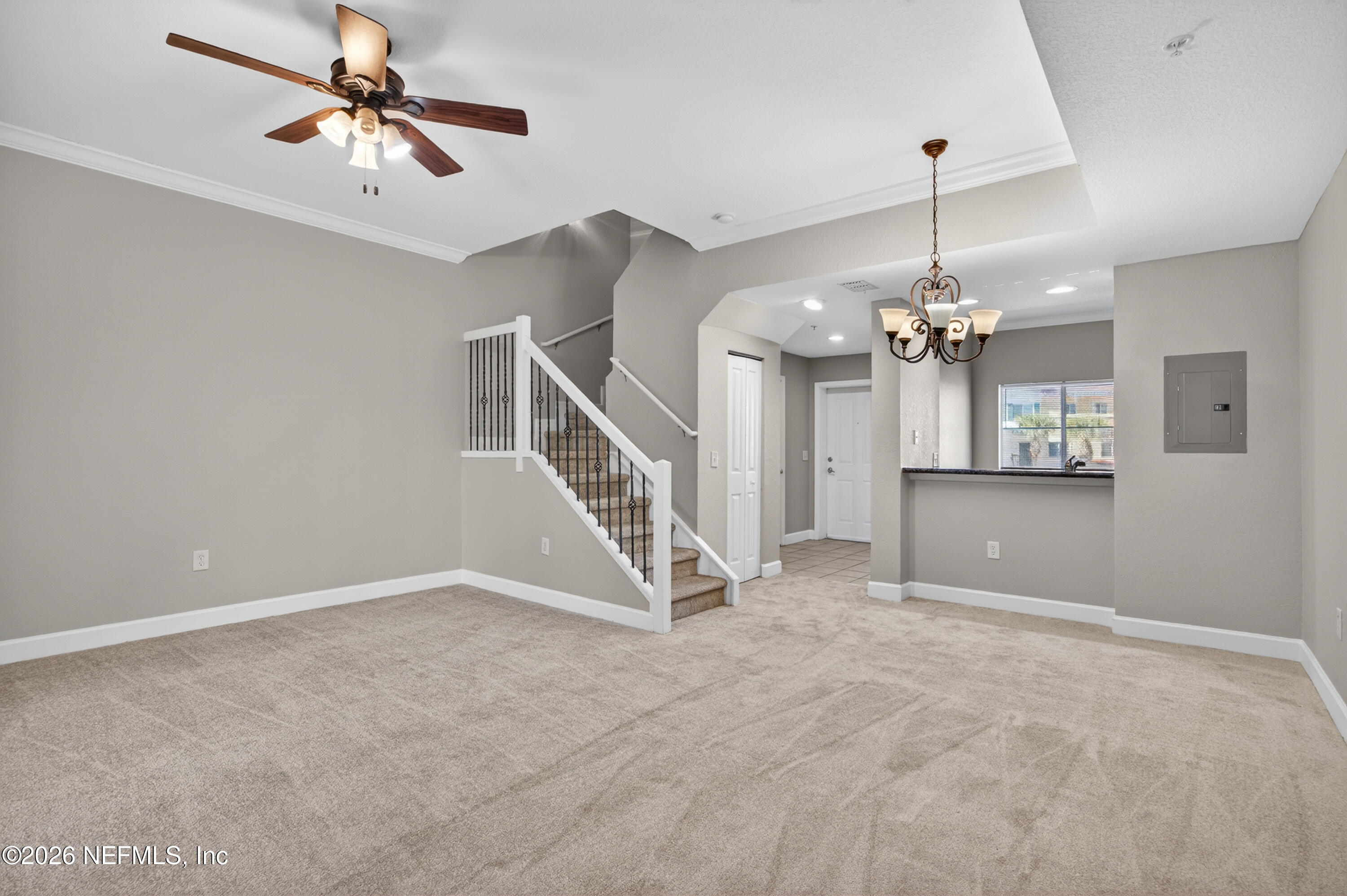 9745 Touchton Road, Unit 624 Jacksonville, FL 32246 - Photo 5 of 25 Living area to entry and kitchen