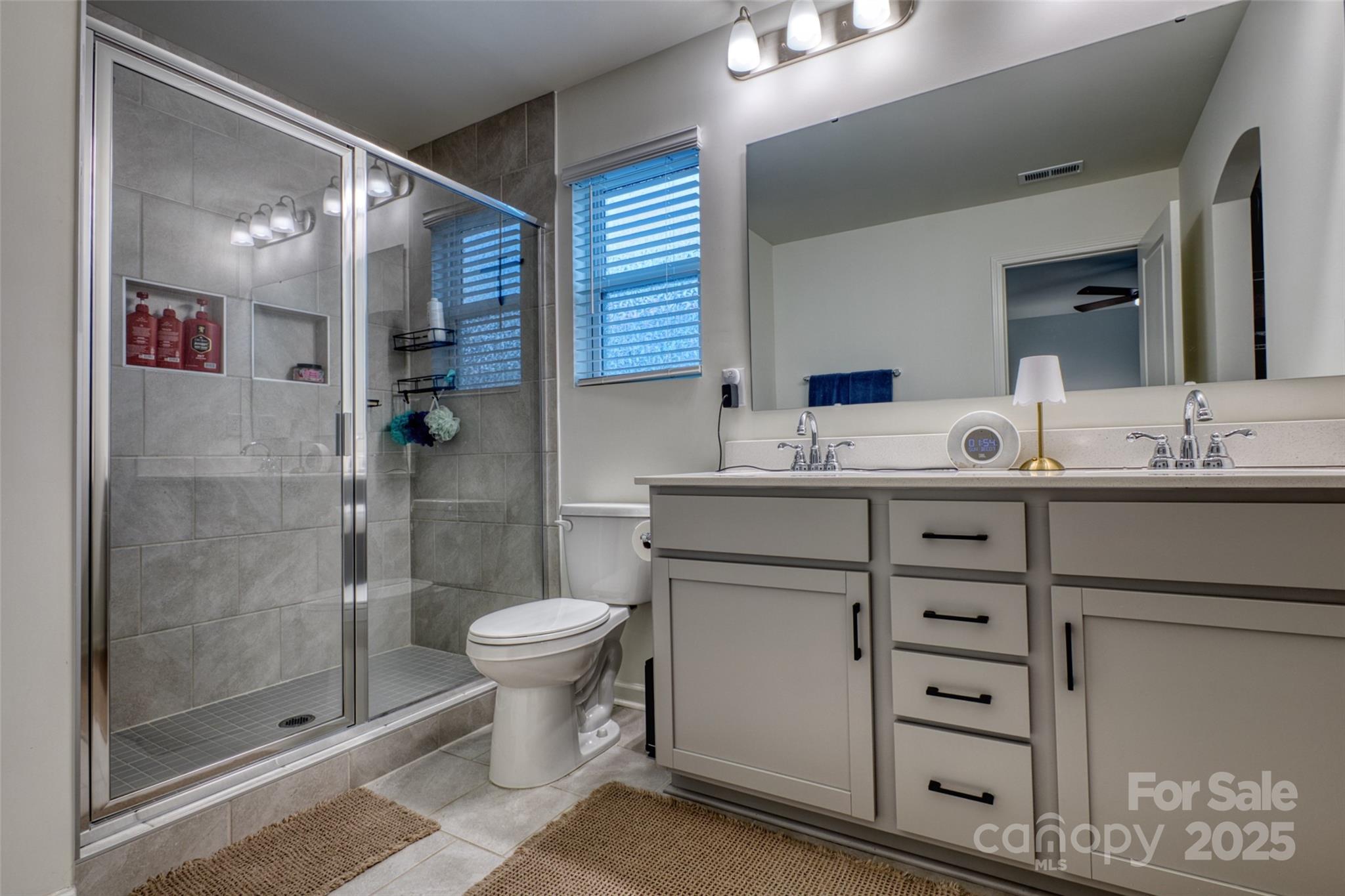 620 Candela Court York, SC 29745 - Photo 35 of 46 a bathroom with a sink toilet and shower