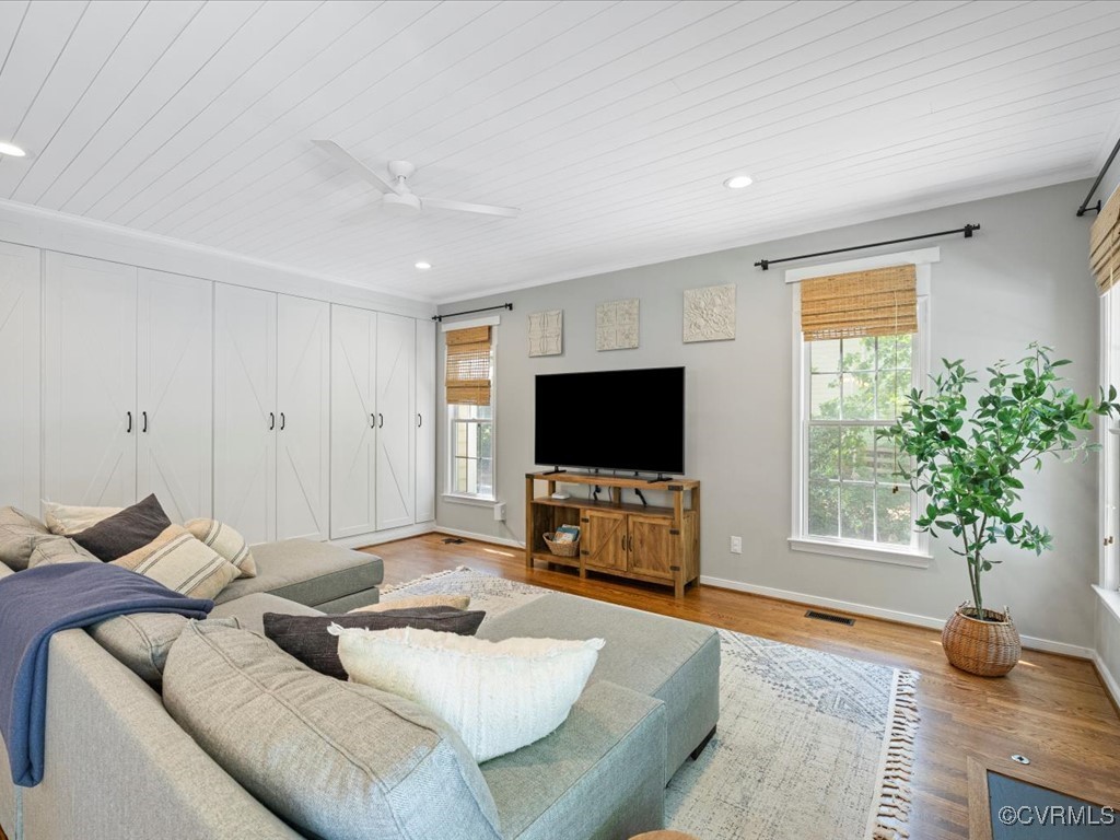 15418 Foxvale Way Midlothian, VA 23112 - Photo 11 of 50 a living room with furniture and a flat screen tv