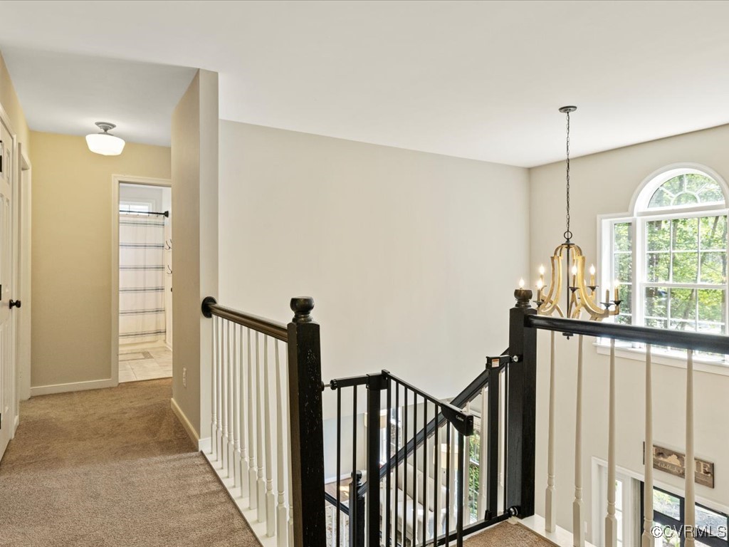 15418 Foxvale Way Midlothian, VA 23112 - Photo 18 of 50 a view of a hallway with windows
