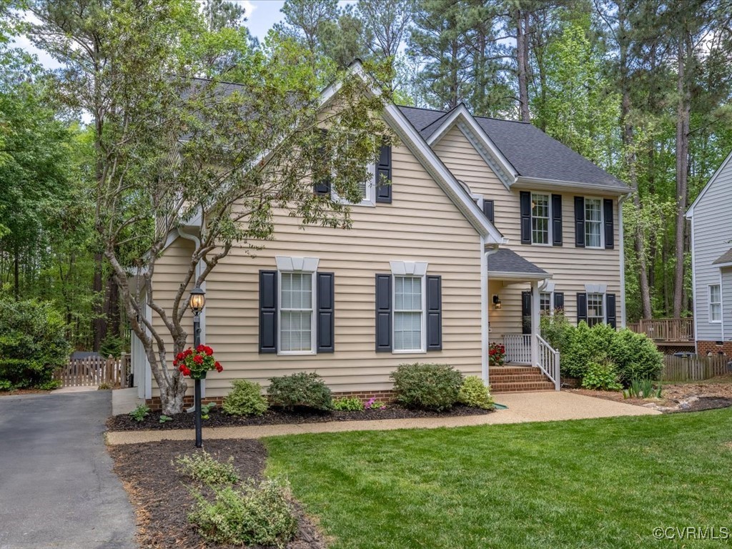 15418 Foxvale Way Midlothian, VA 23112 - Photo 2 of 50 a front view of a house with a yard