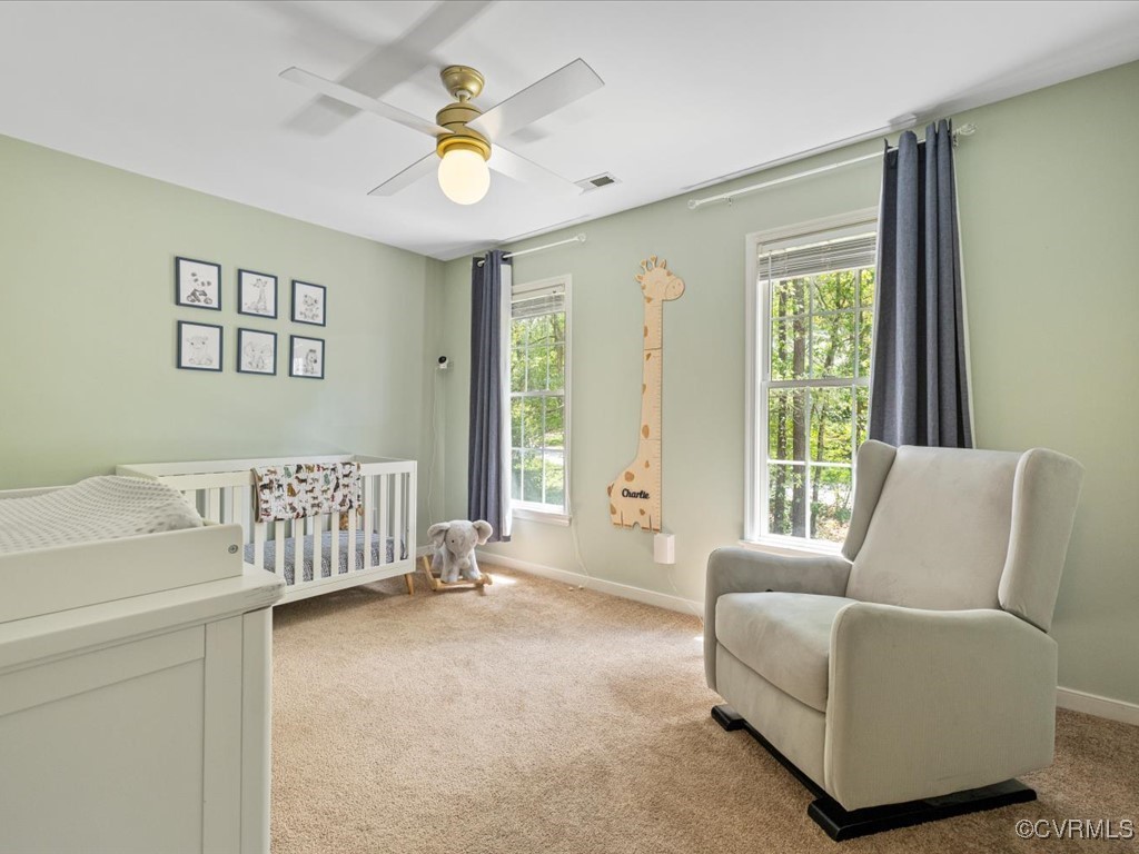 15418 Foxvale Way Midlothian, VA 23112 - Photo 25 of 50 a living room with furniture and a large window