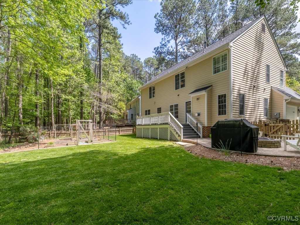 15418 Foxvale Way Midlothian, VA 23112 - Photo 35 of 50 a view of a house with backyard and a tree