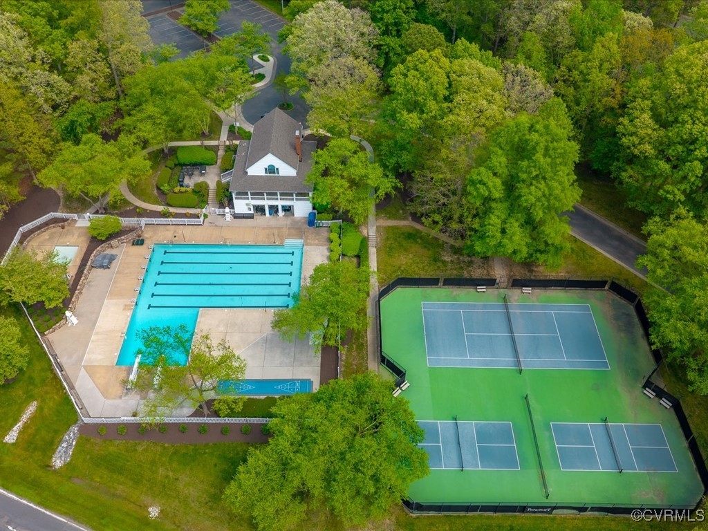15418 Foxvale Way Midlothian, VA 23112 - Photo 43 of 50 a view of a yard with plants and a bench