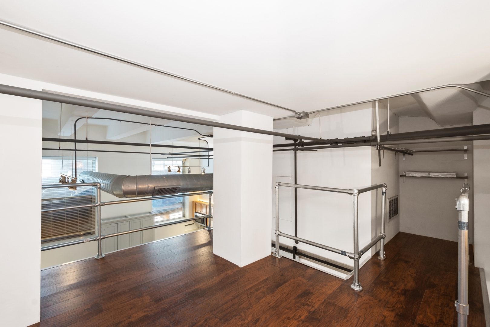 500 South Clinton Street, Unit 101 Chicago, IL 60607 - Photo 5 of 11 a view of a room with wooden floor