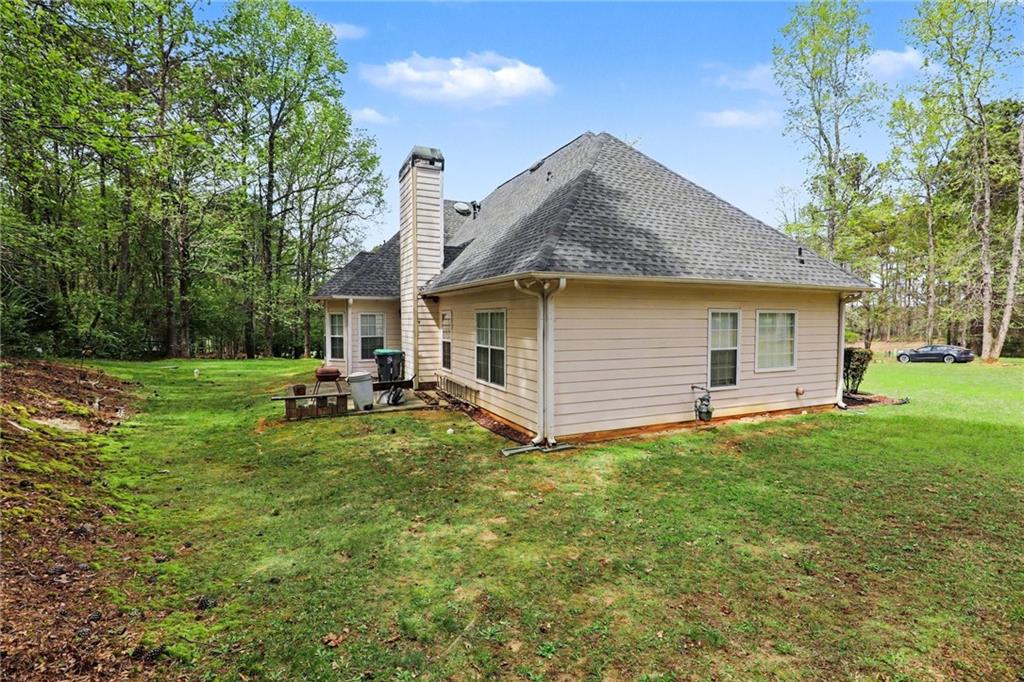 1041 Olive Drive Hampton, GA 30228 - Photo 26 of 29 a view of a house with backyard